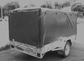 Trailer cover using green PVC.