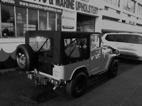 Toyota Jeep soft top, using Sonnedecke 1 canvas and Achilles 1mm clear PVC.